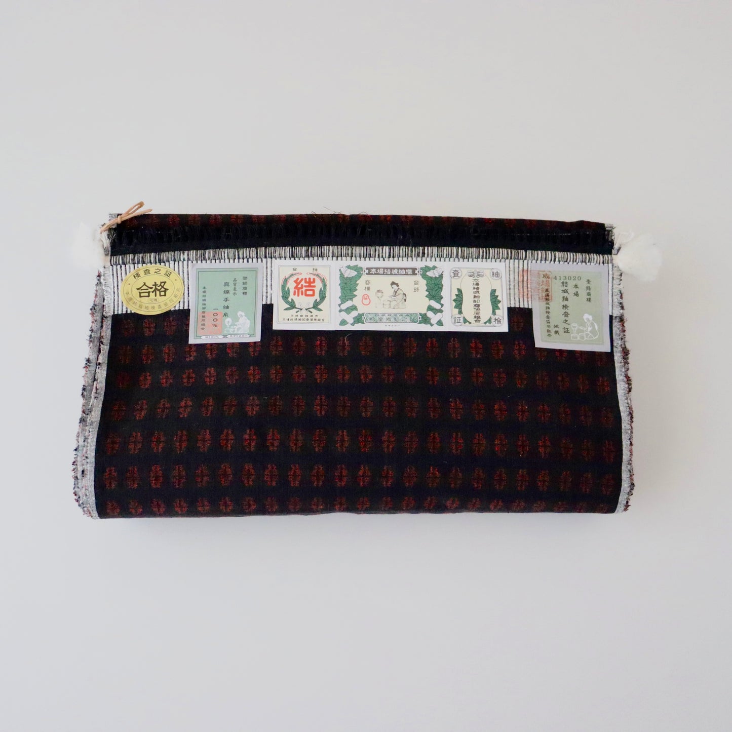 本場結城紬「大正絣 墨黒緋紋」小倉商店