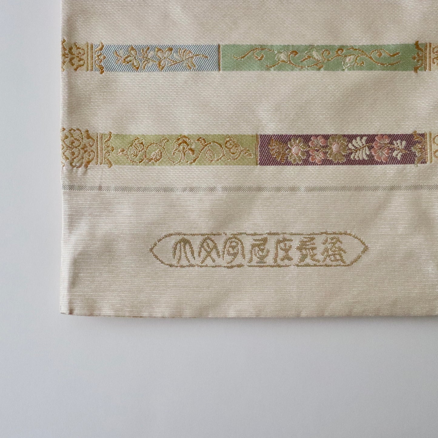袋帯「吉祥如意文 *正倉院犀角如意」大文字屋庄兵衛