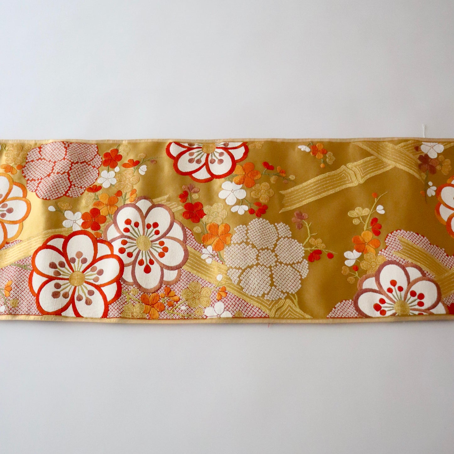 袋帯「竹垣梅花文」梅垣織物