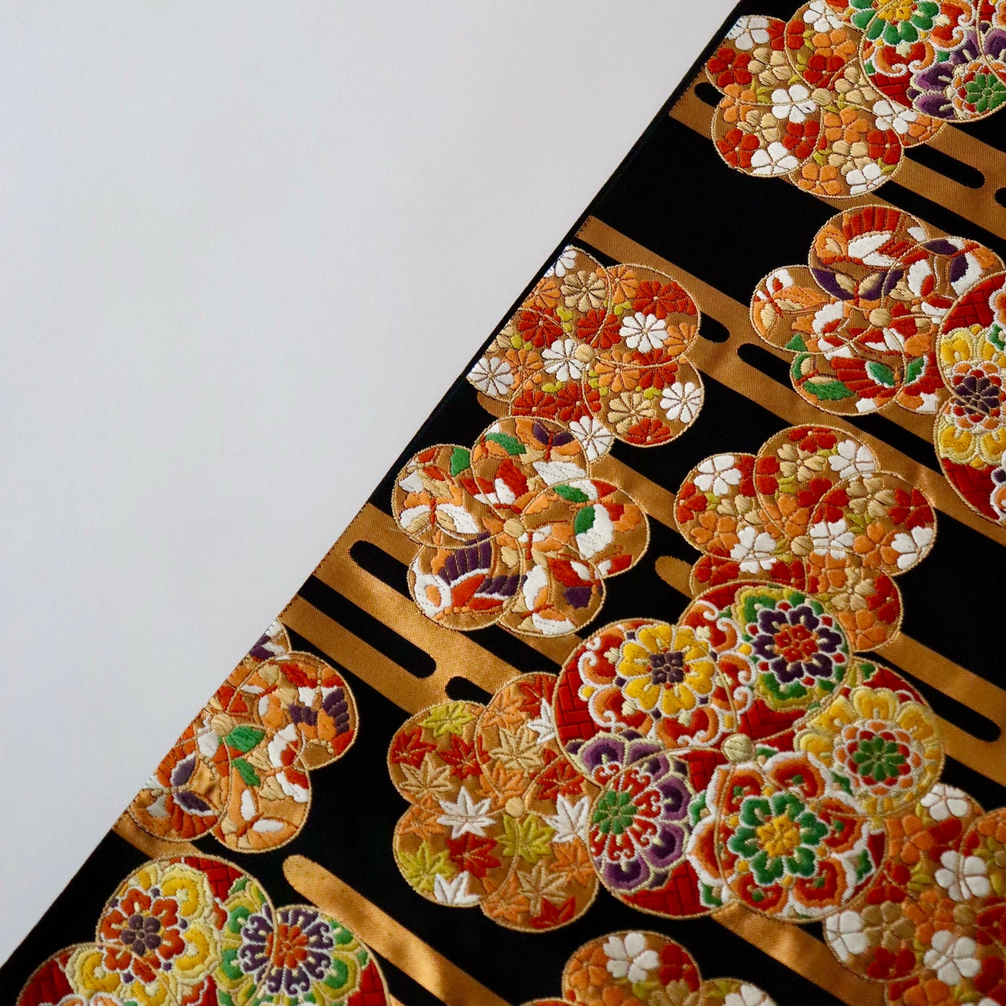 袋帯「霞に捻り梅」河合美術織物