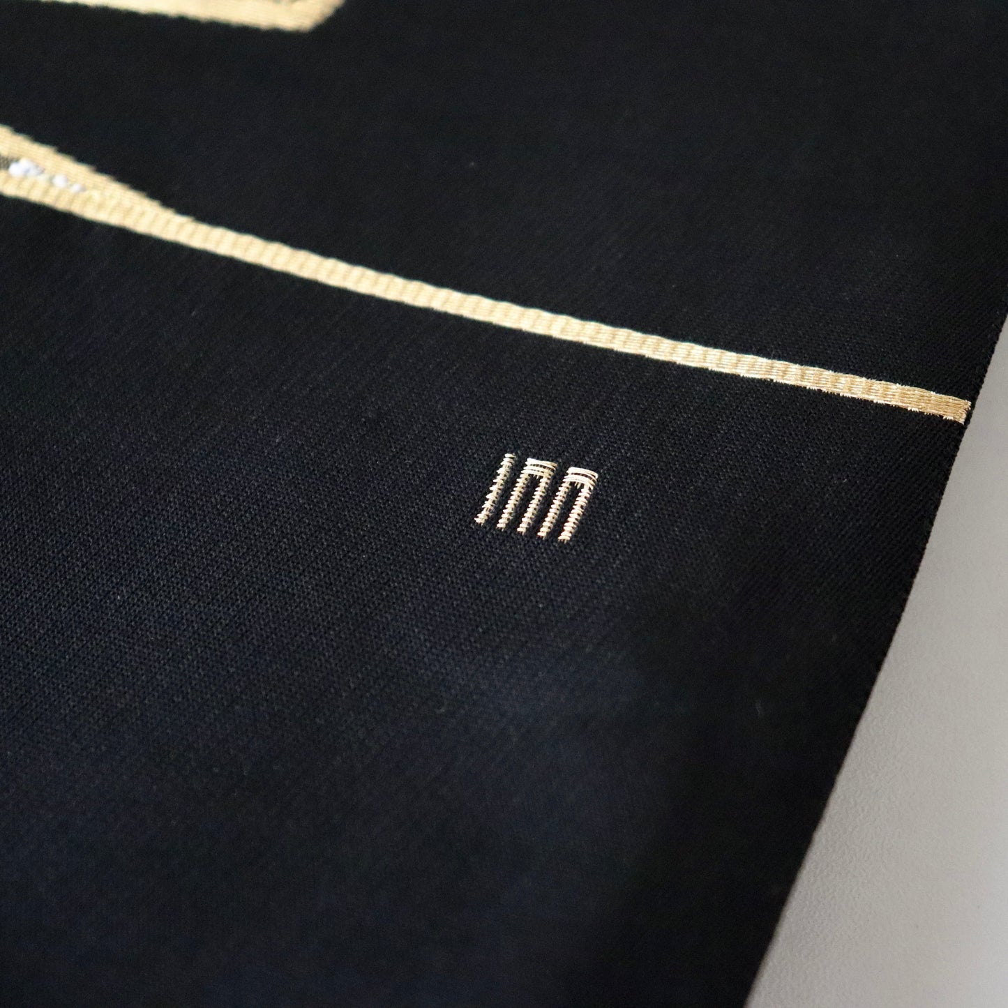 袋帯「錦地能衣かずら文」紫絋