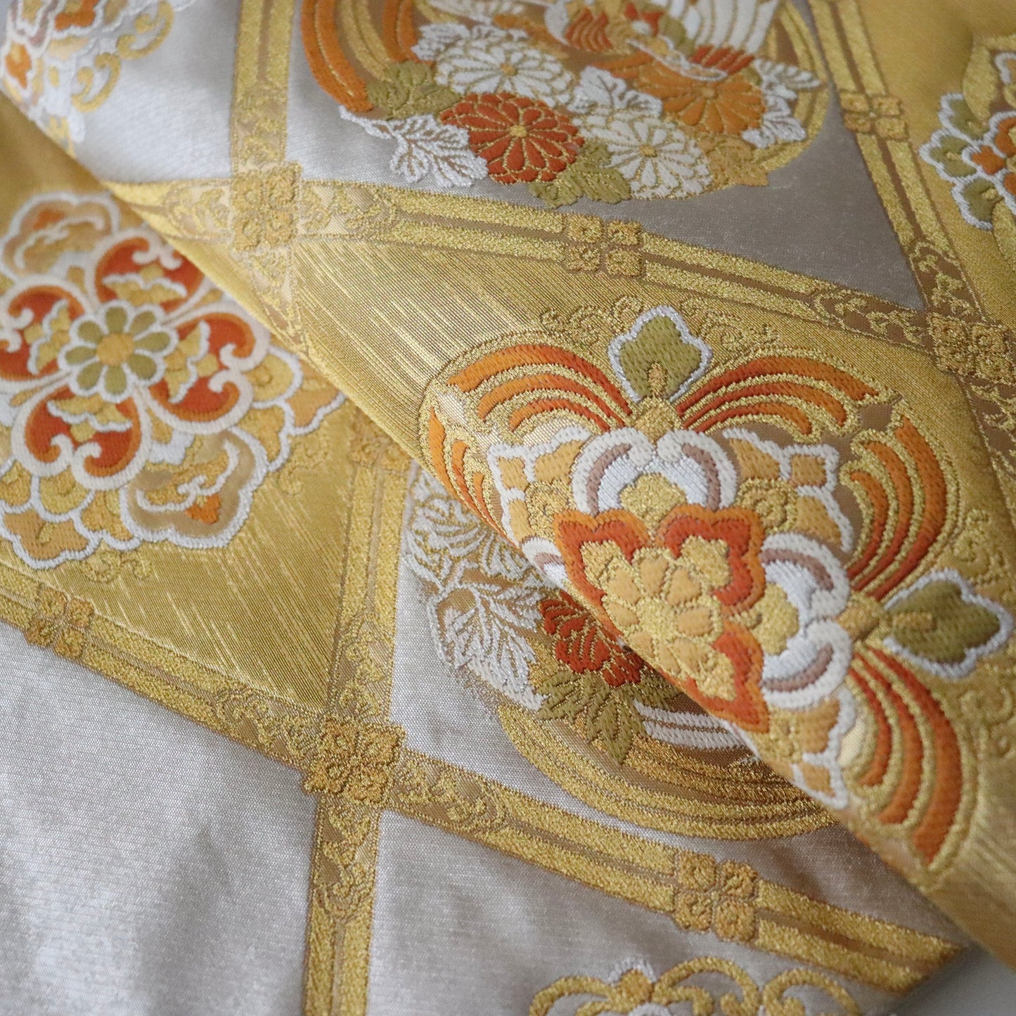 袋帯「格子花鳥華文」梅垣織物