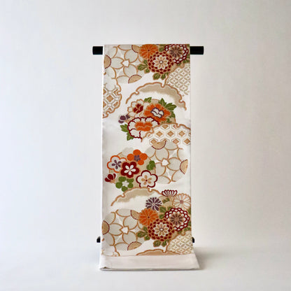 袋帯「花丸文に雪輪」岡文織物