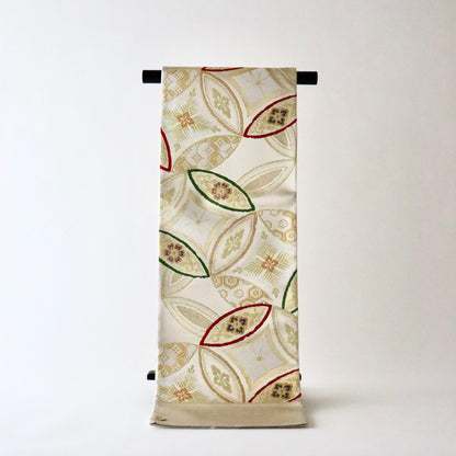 袋帯「経金繻子織 - 七宝吉祥文」志都香