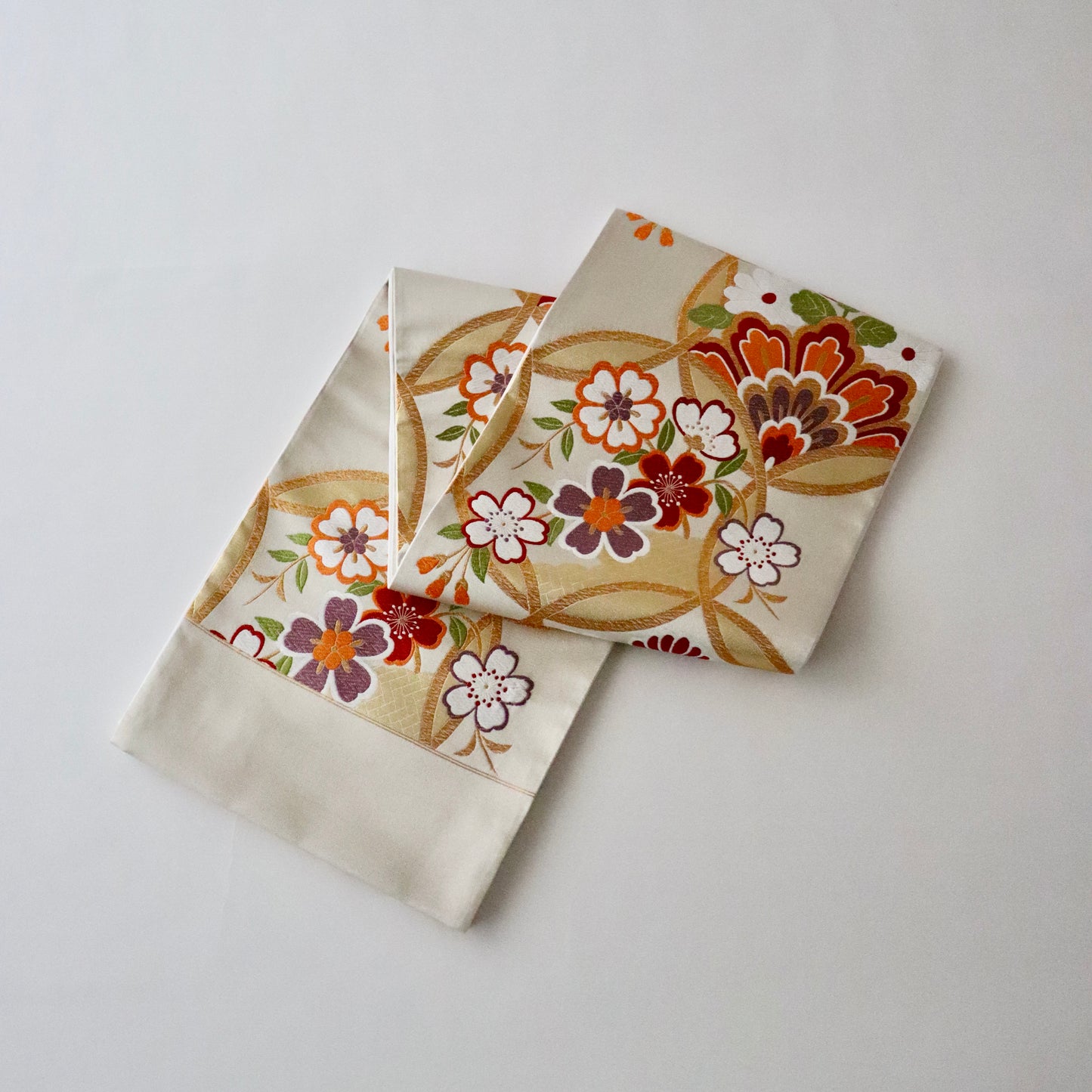 袋帯「輪繋華文」岡文織物