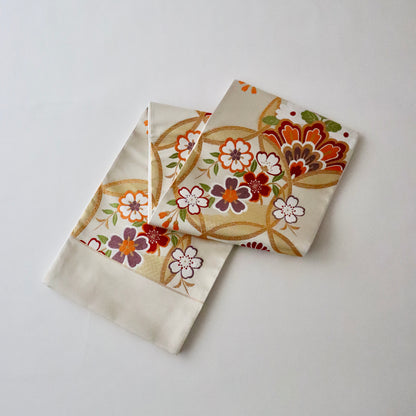 袋帯「輪繋華文」岡文織物