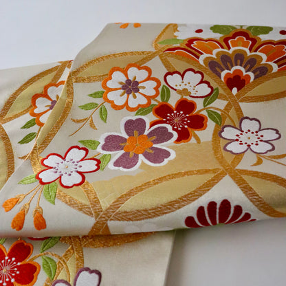 袋帯「輪繋華文」岡文織物