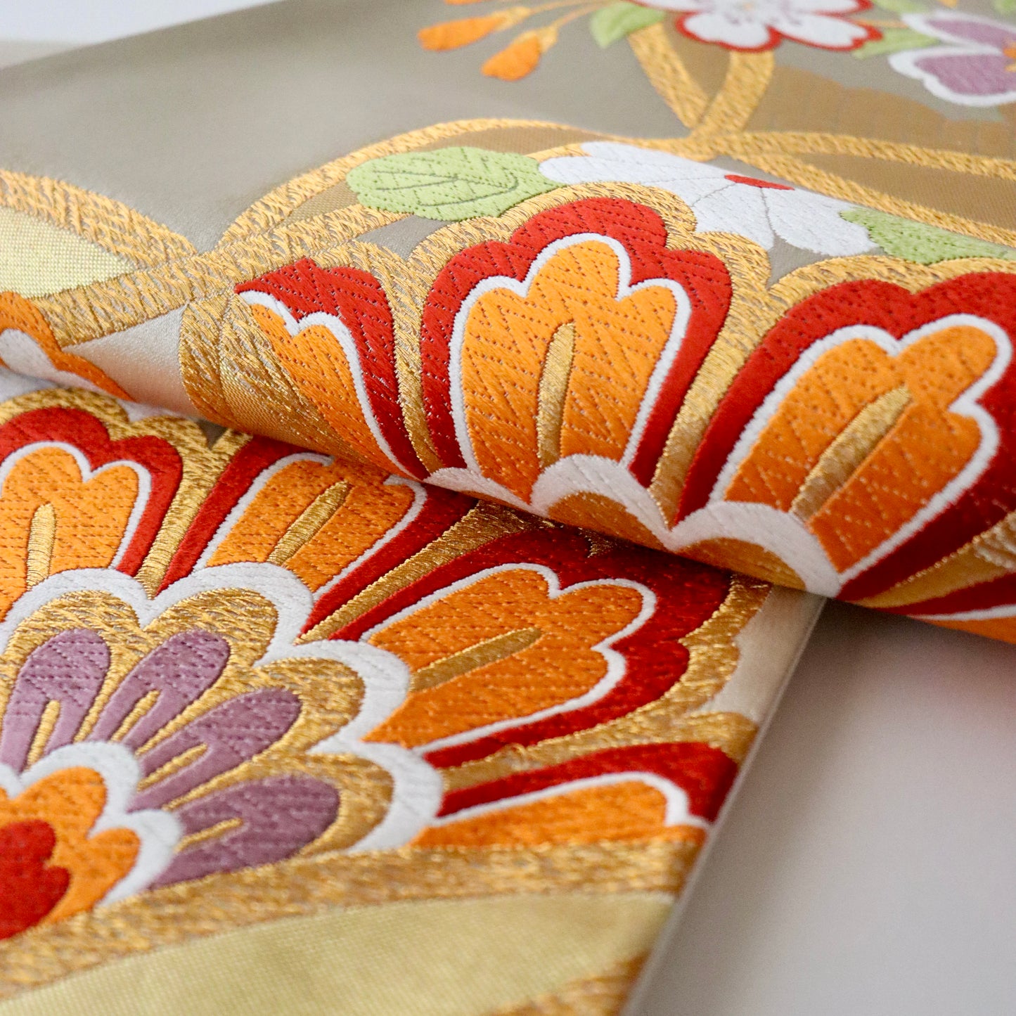 袋帯「輪繋華文」岡文織物