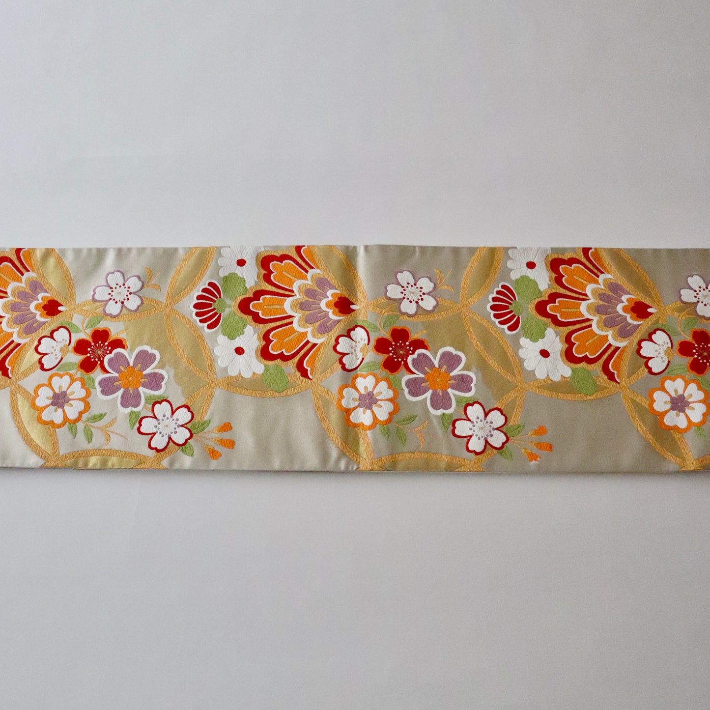 袋帯「輪繋華文」岡文織物