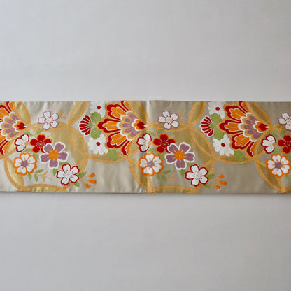 袋帯「輪繋華文」岡文織物