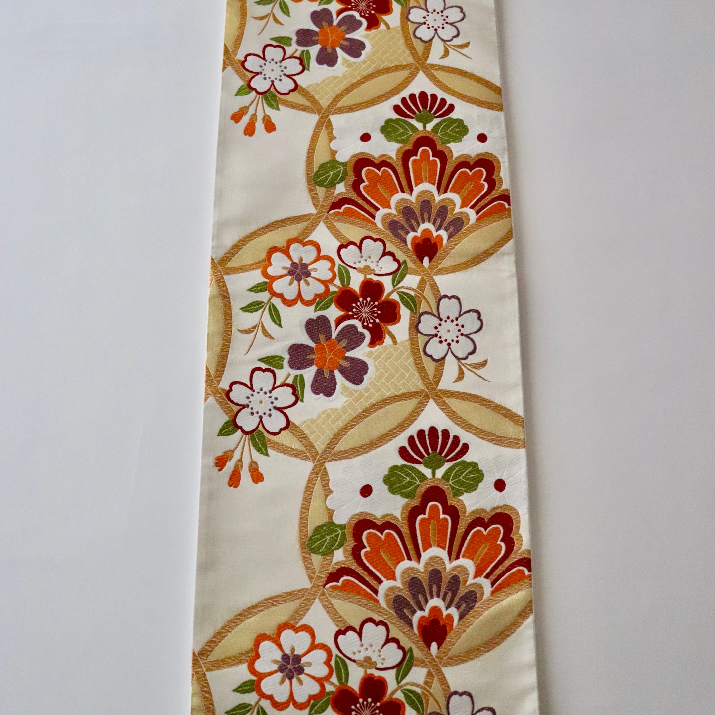 袋帯「輪繋華文」岡文織物