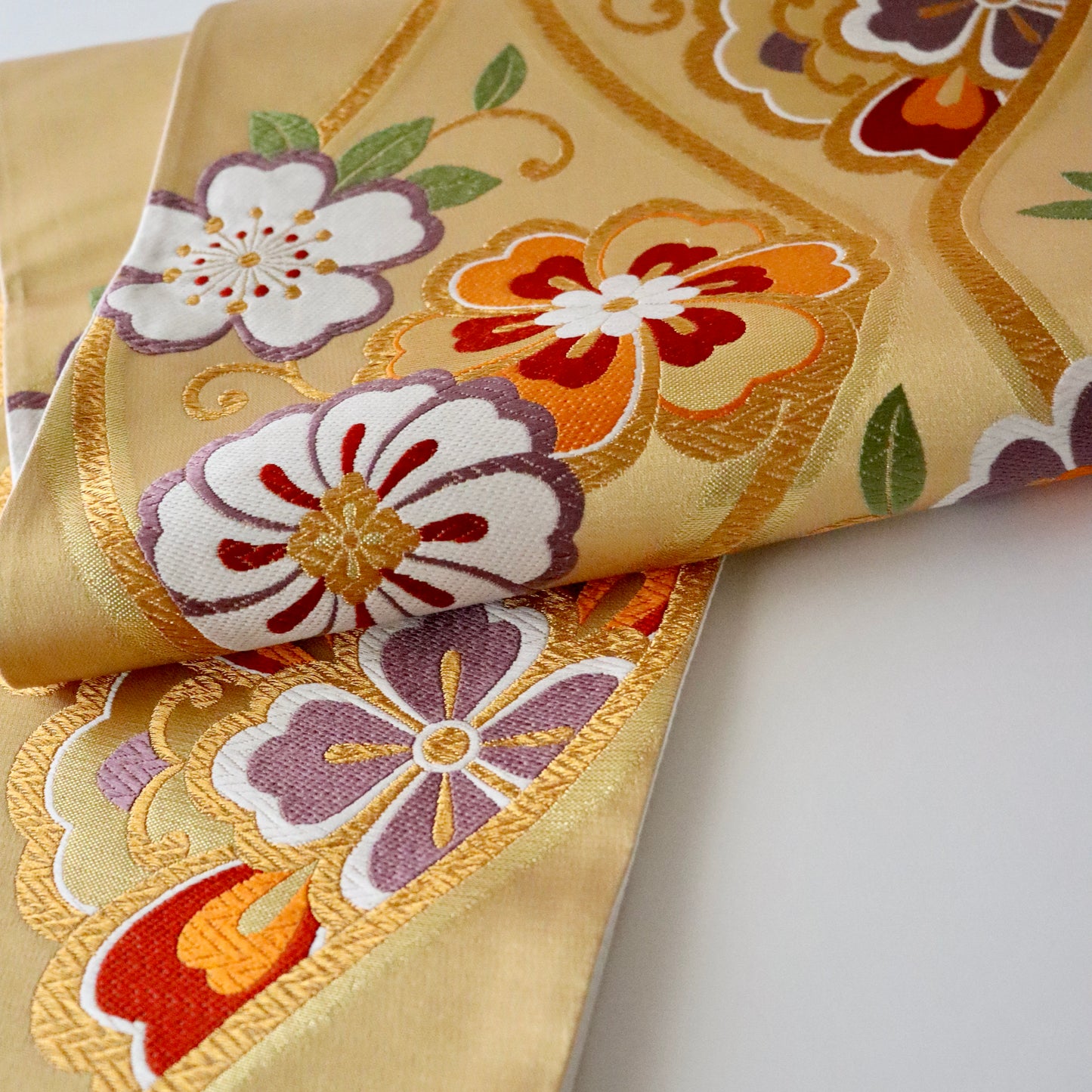 袋帯「華立涌」岡文織物