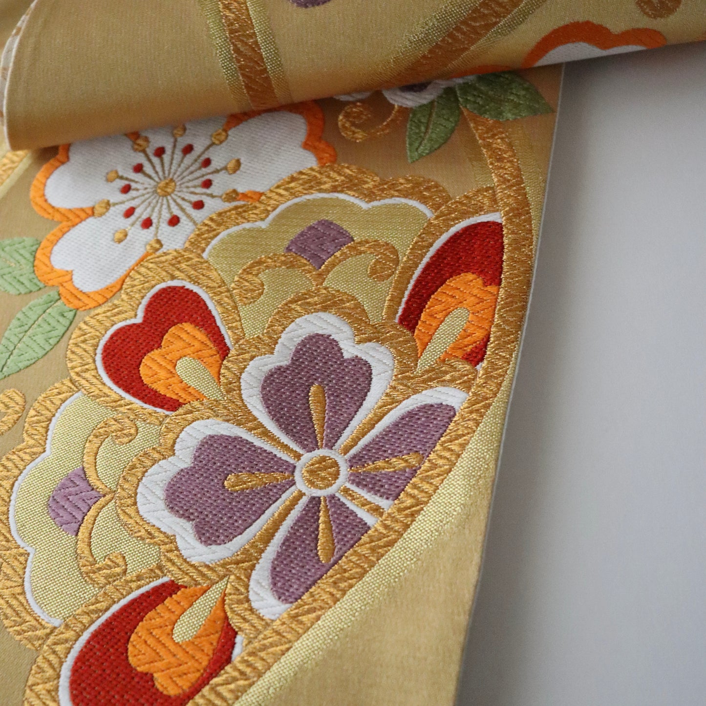 袋帯「華立涌」岡文織物