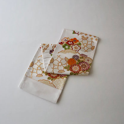 袋帯「花丸文に雪輪」岡文織物