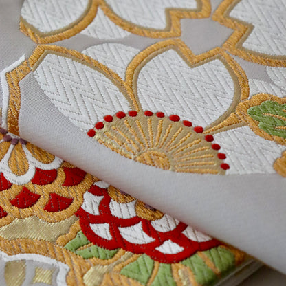 袋帯「花丸文に雪輪」岡文織物