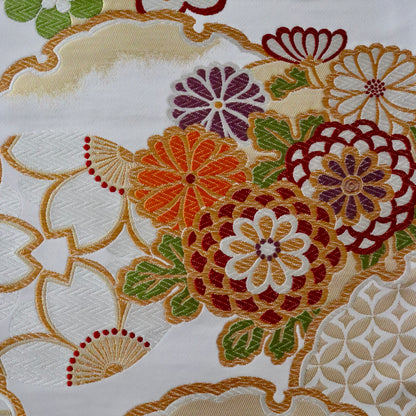 袋帯「花丸文に雪輪」岡文織物