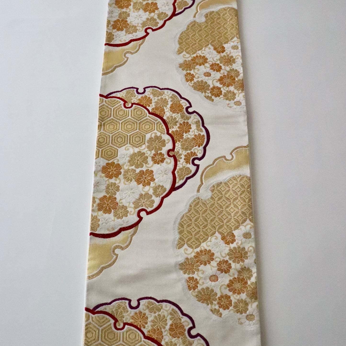 袋帯「雪輪重ね」岡文織物