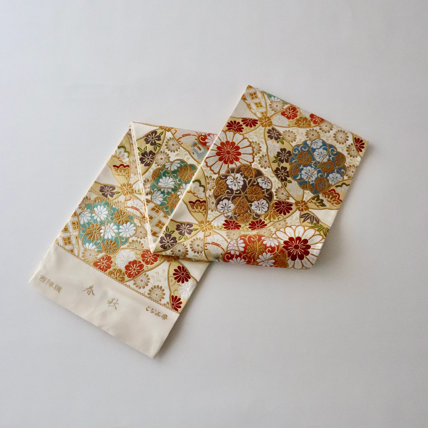 袋帯「春秋 七宝花散文」となみ織物