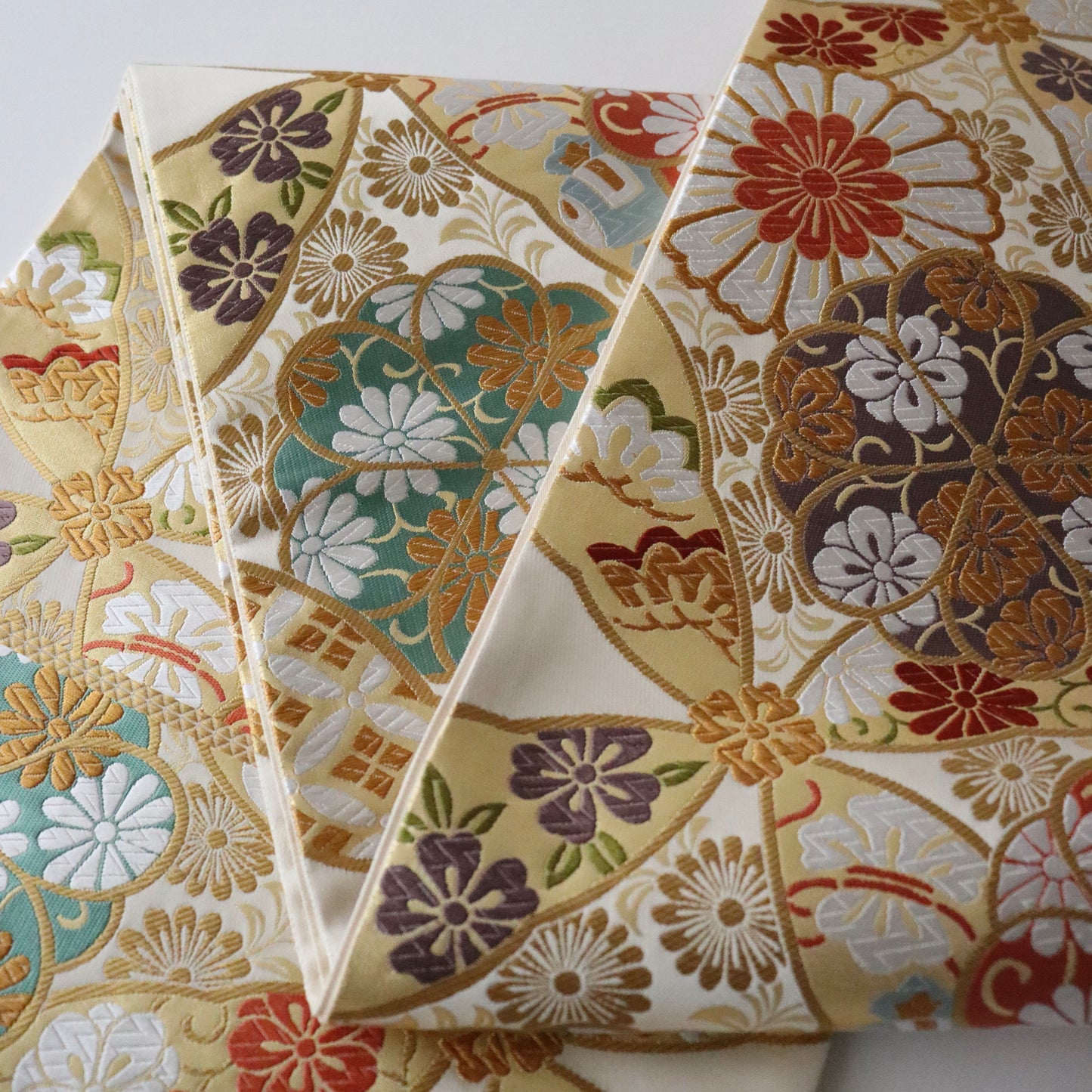 袋帯「春秋 七宝花散文」となみ織物