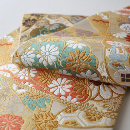 袋帯「春秋 七宝花散文」となみ織物