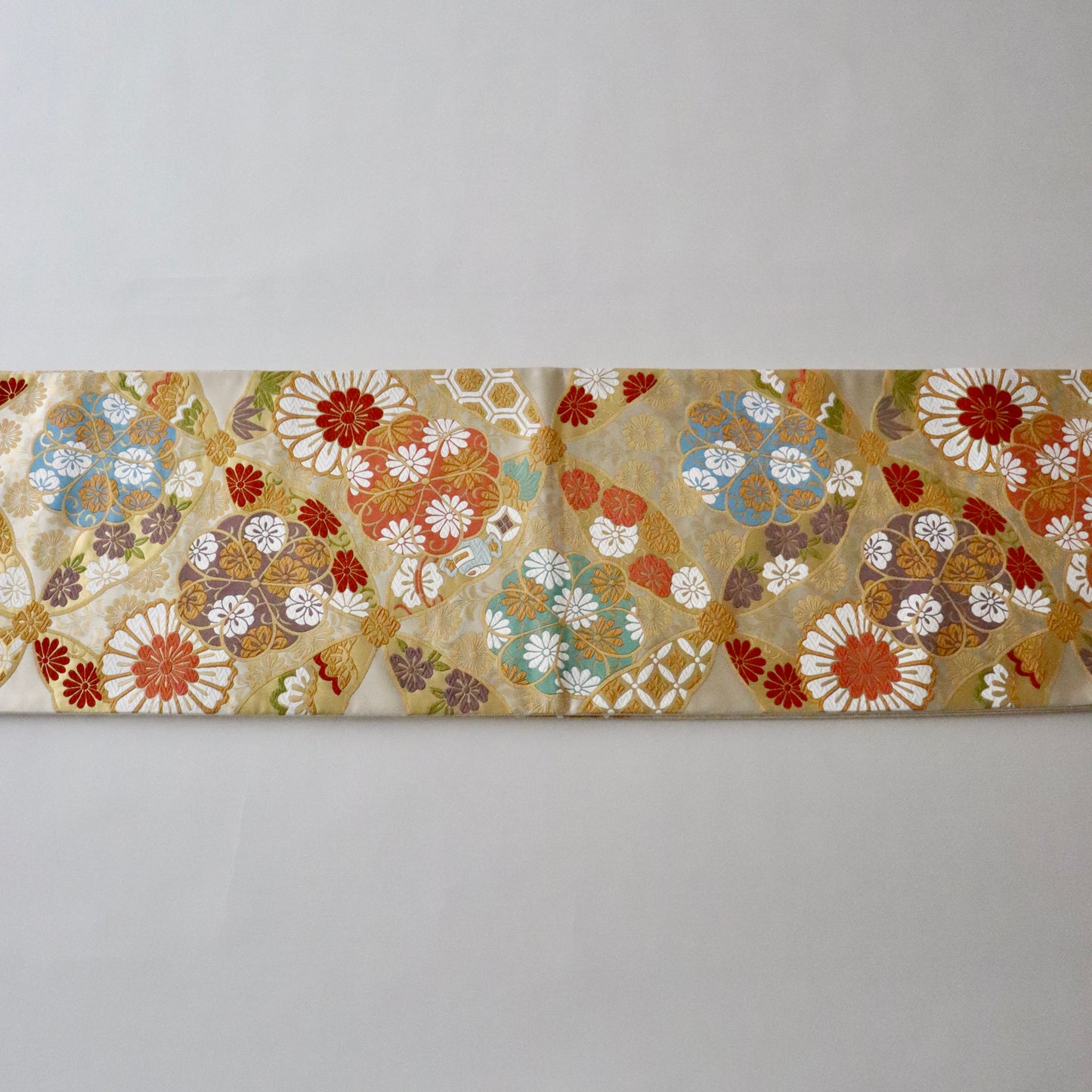 袋帯「春秋 七宝花散文」となみ織物