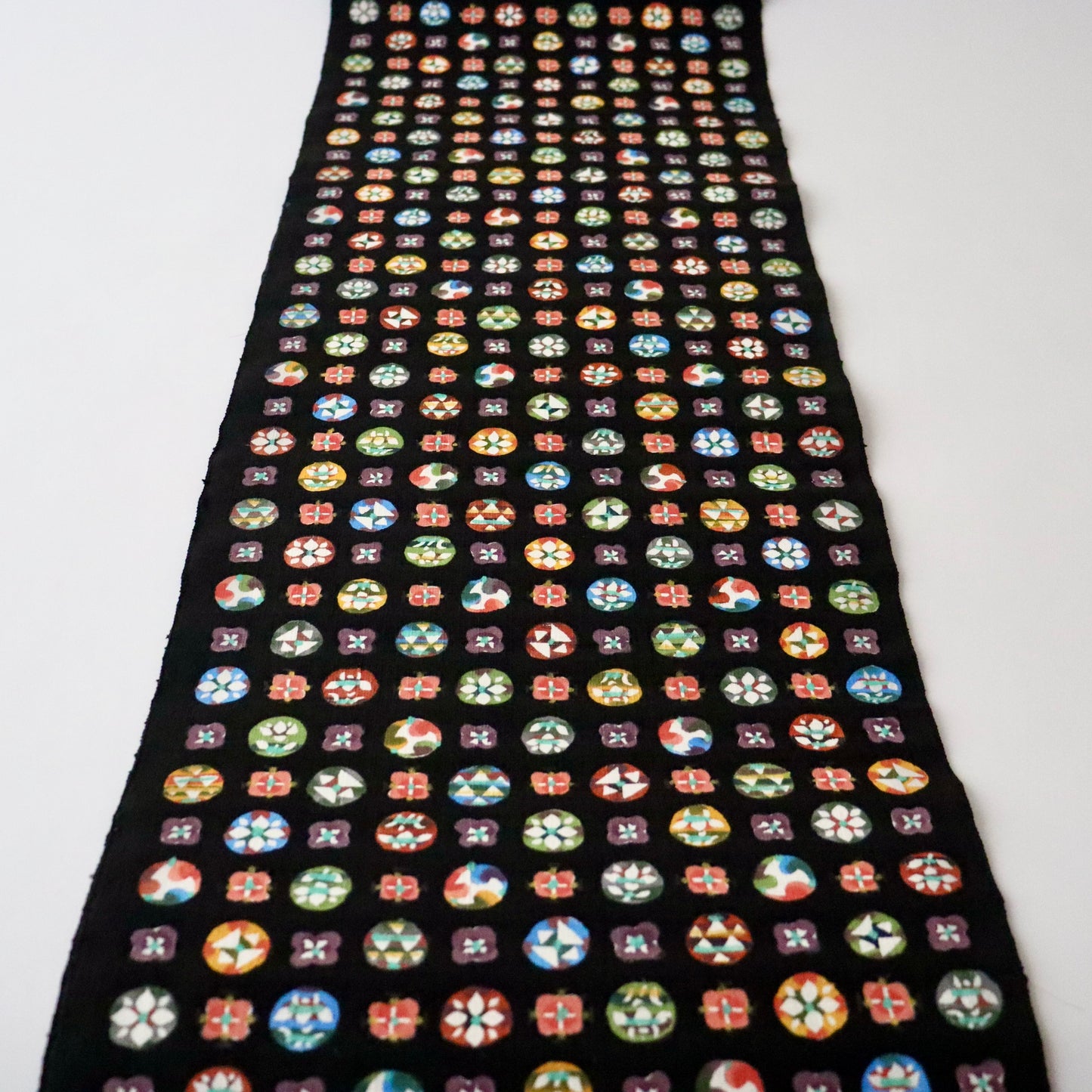 九寸名古屋帯「型絵染 - 丸紋」小島貞二