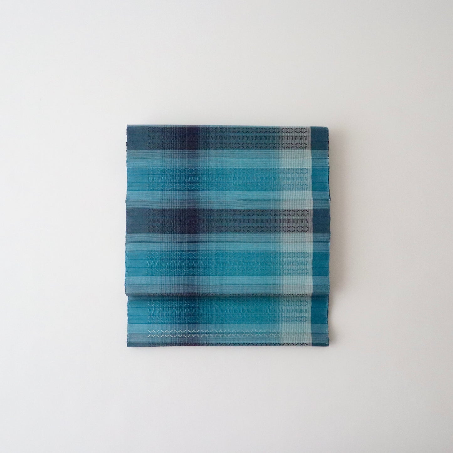 九寸名古屋帯「首里花倉織 - 碧縞」赤嶺真澄