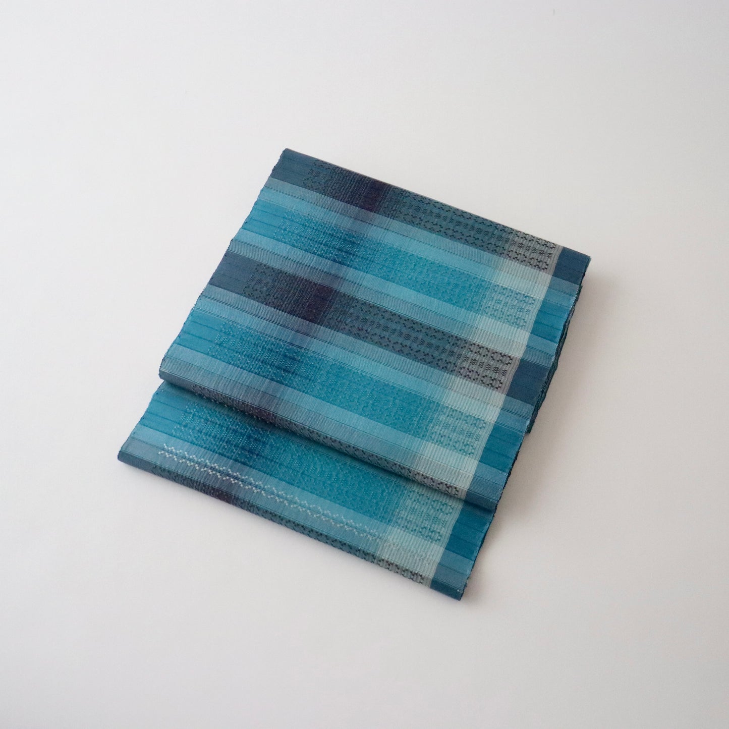 九寸名古屋帯「首里花倉織 - 碧縞」赤嶺真澄