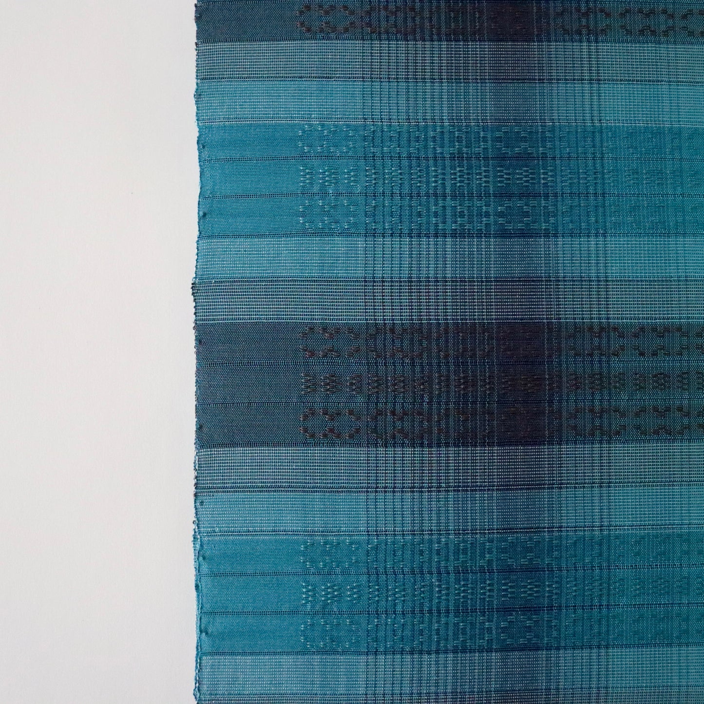 九寸名古屋帯「首里花倉織 - 碧縞」赤嶺真澄