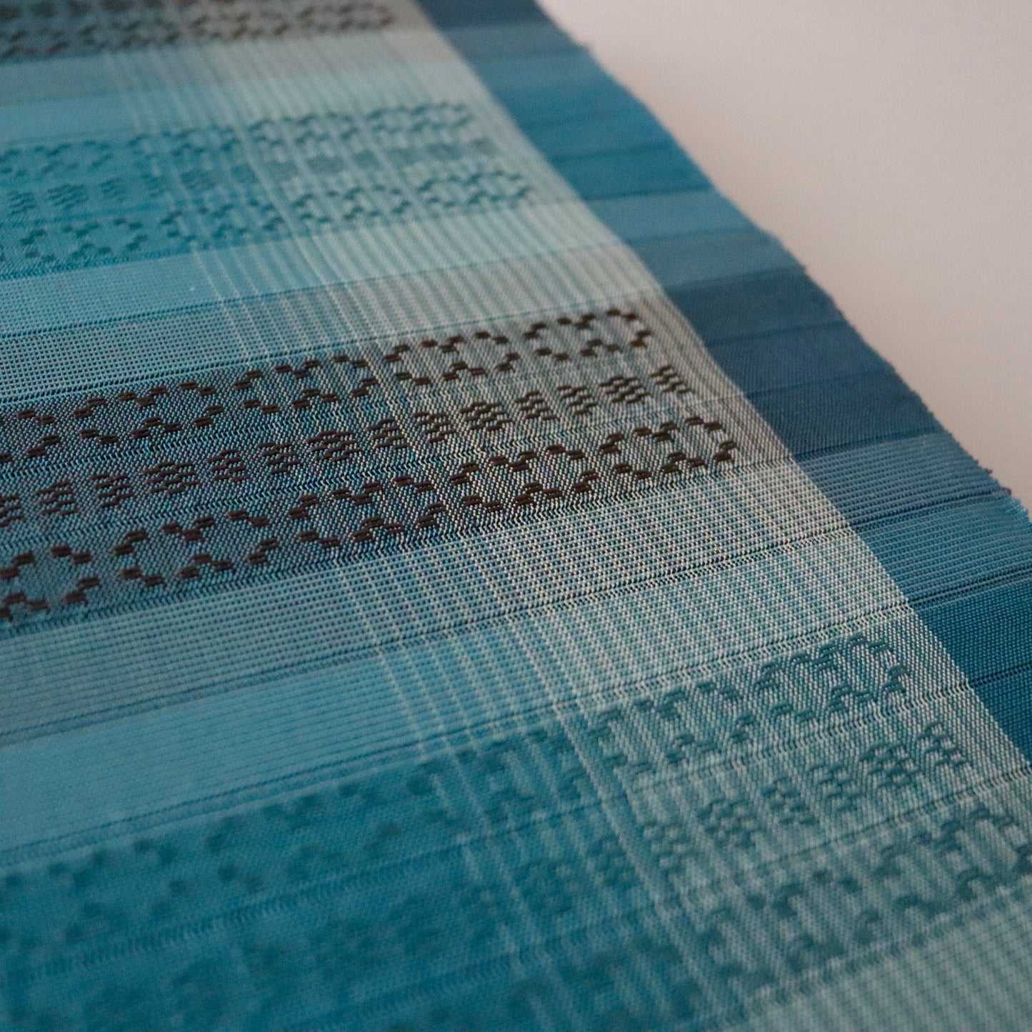 九寸名古屋帯「首里花倉織 - 碧縞」赤嶺真澄