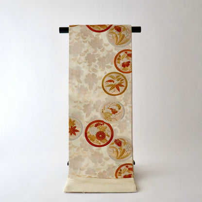 袋帯「桜狂言丸文」梅垣織物