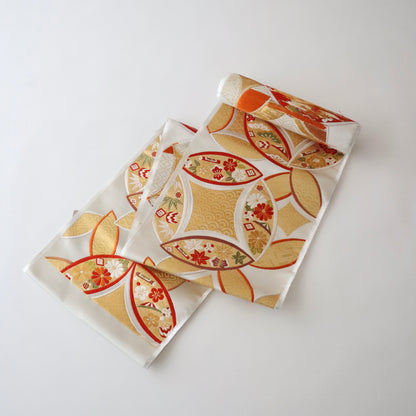 袋帯「小袖重ね七宝文」梅垣織物