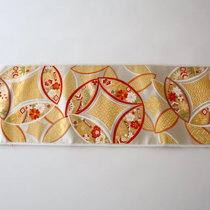 袋帯「小袖重ね七宝文」梅垣織物