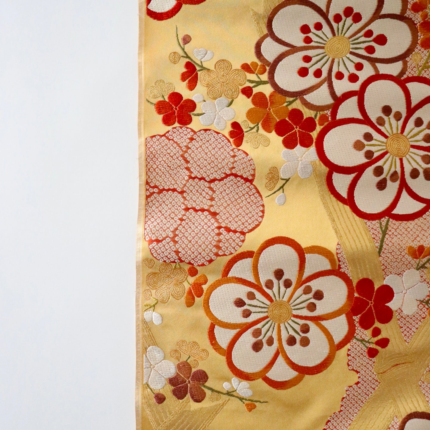 袋帯「竹垣梅花文」梅垣織物