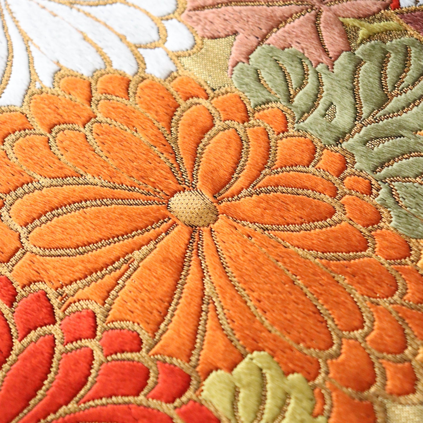 袋帯「裂形春秋花文」梅垣織物