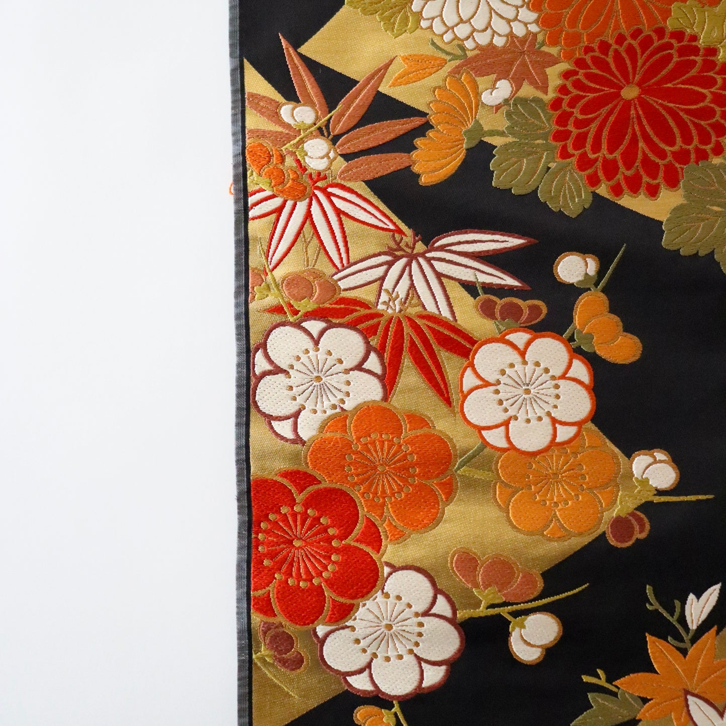 袋帯「裂形春秋花文」梅垣織物