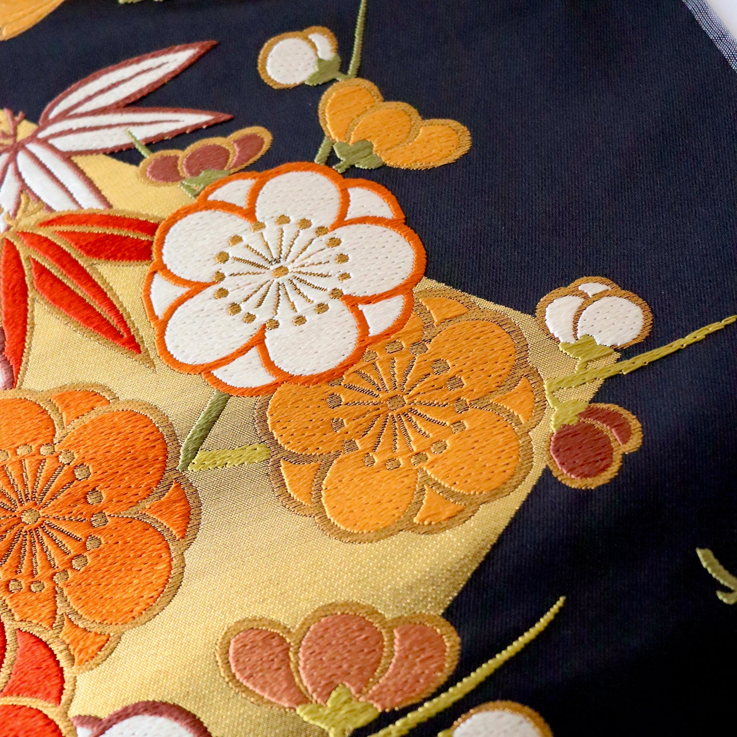 袋帯「裂形春秋花文」梅垣織物