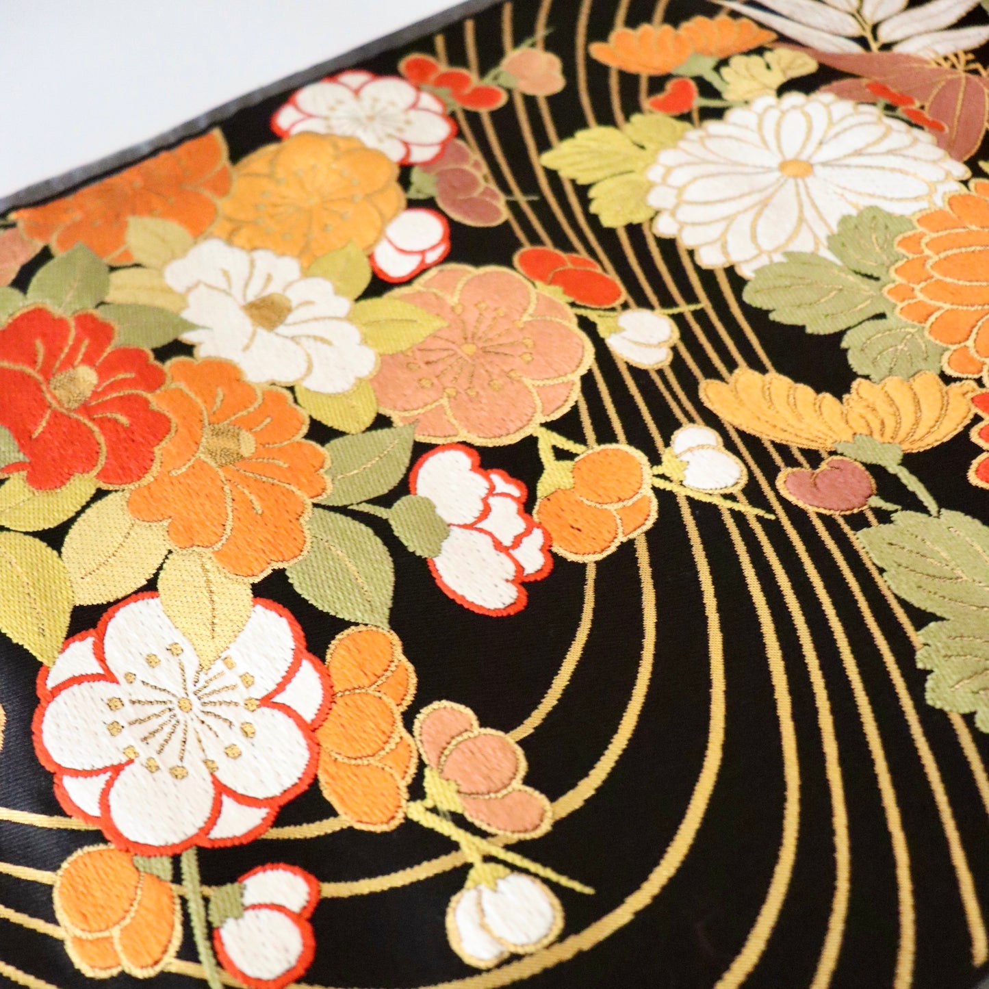 袋帯「流水菊椿文」梅垣織物