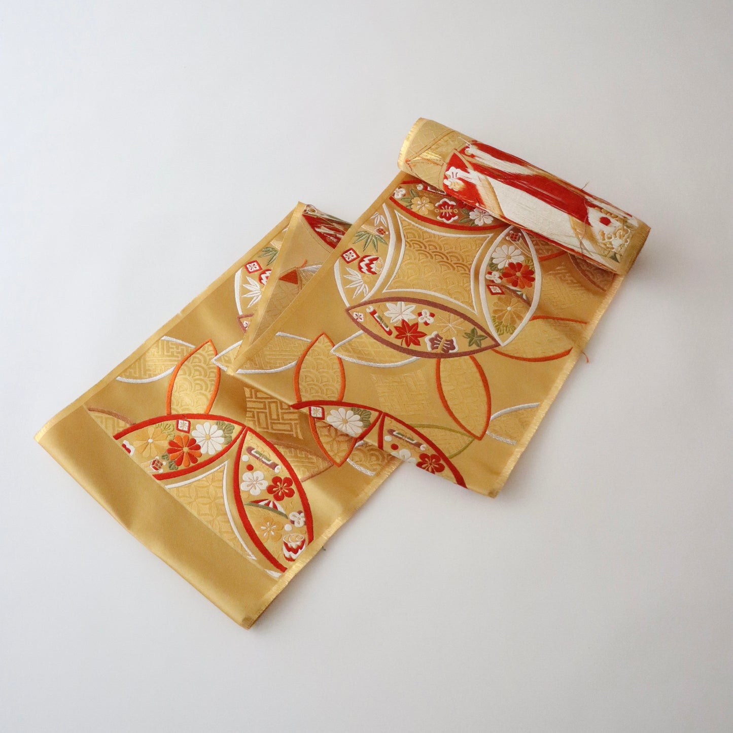 袋帯「小袖重ね七宝文」梅垣織物