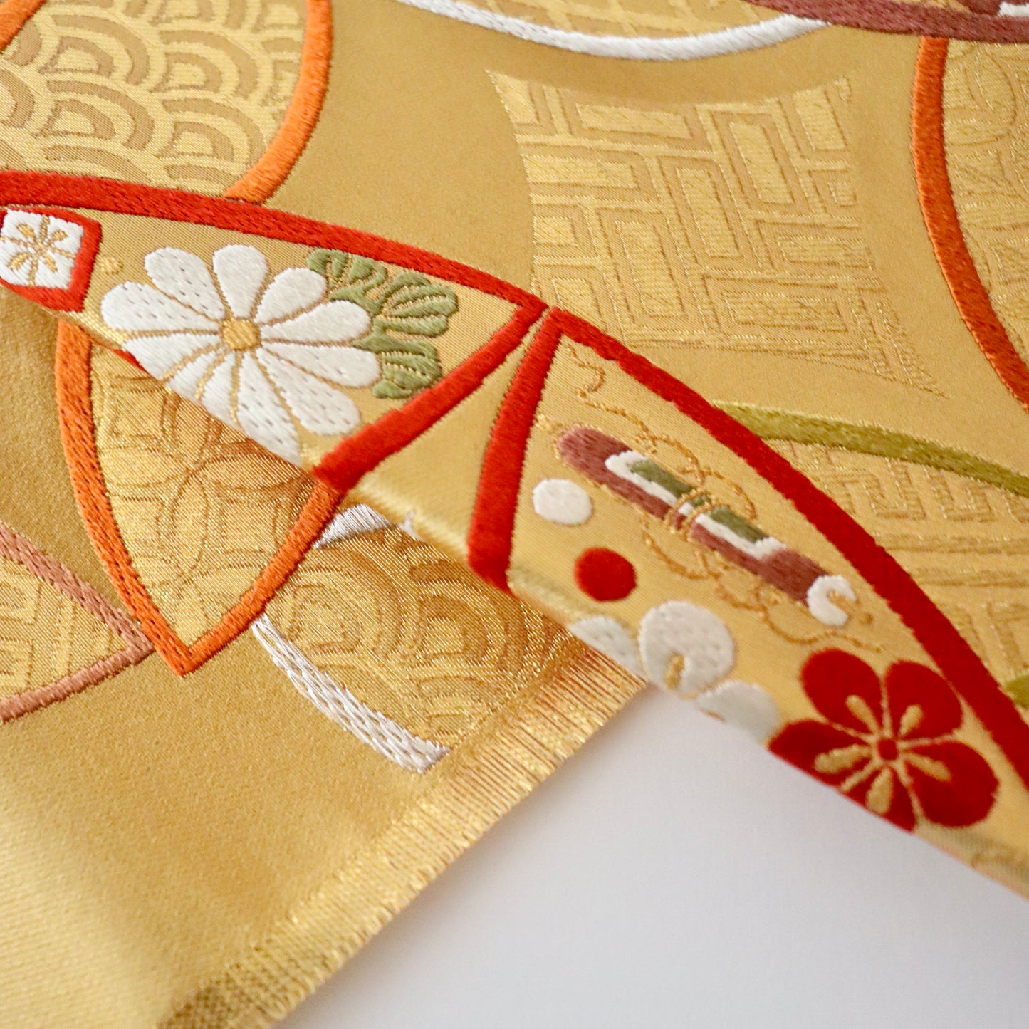 袋帯「小袖重ね七宝文」梅垣織物