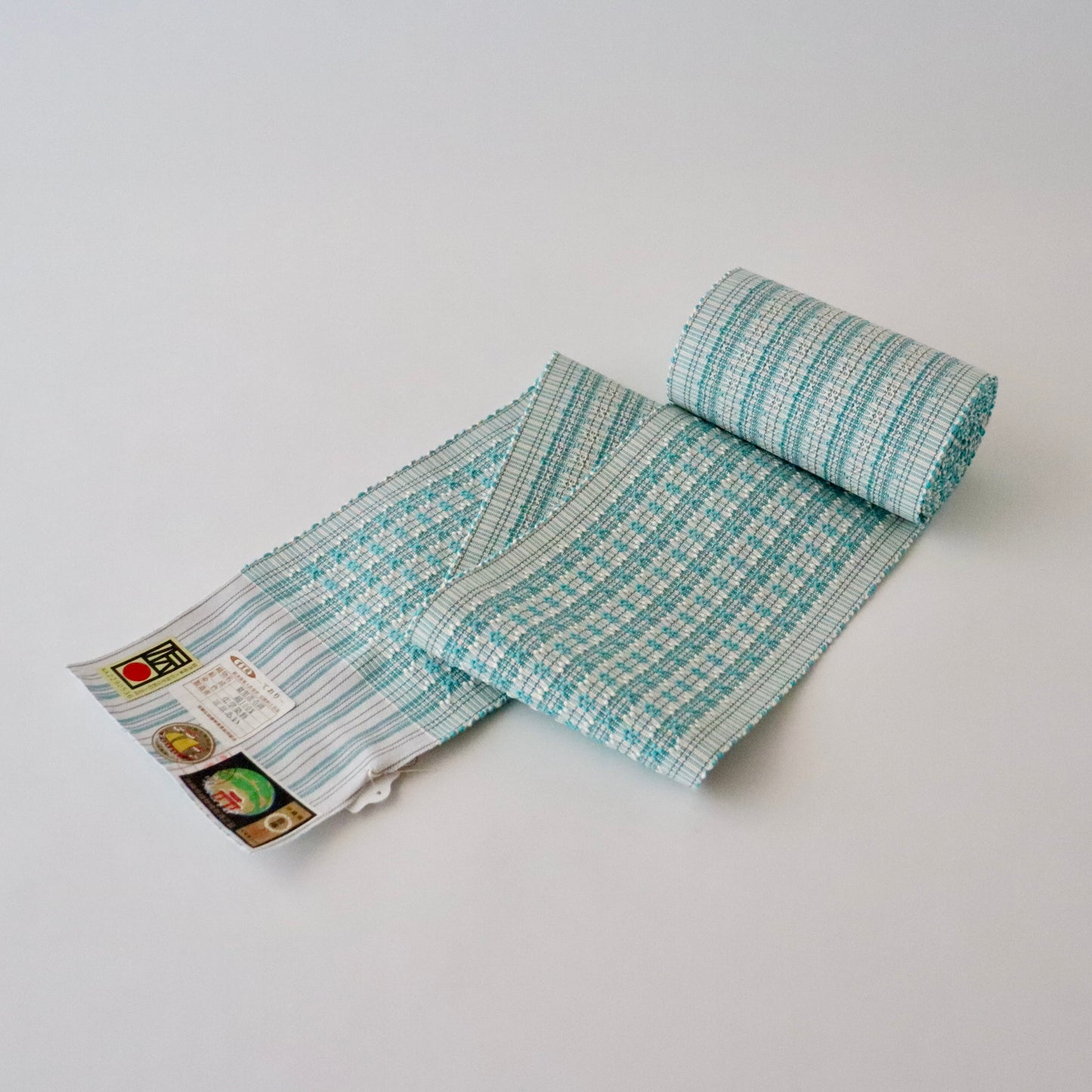 四寸帯「首里道屯織 -lt.grn」富原あい