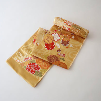 袋帯「流水色紙花文」梅垣織物