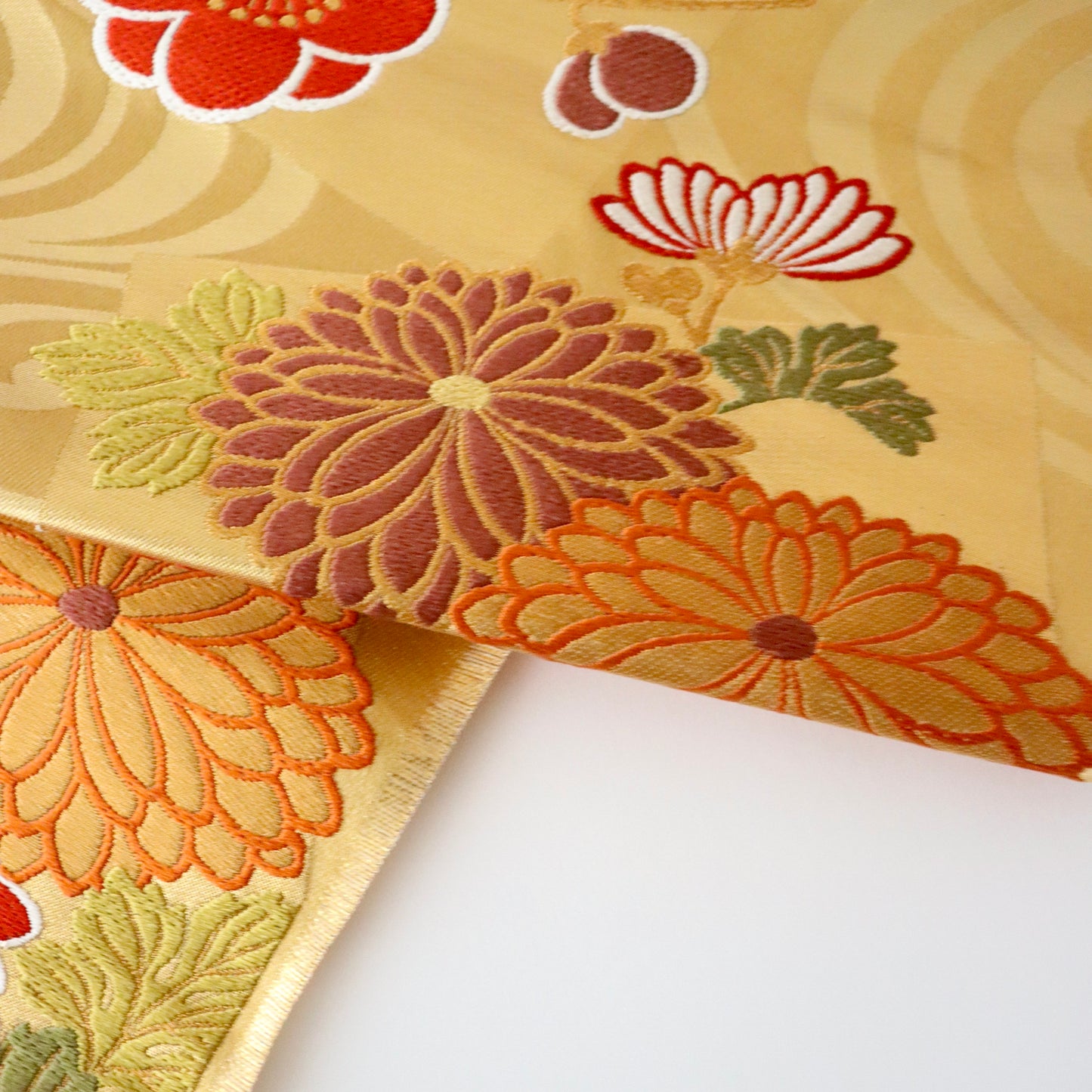 袋帯「流水色紙花文」梅垣織物