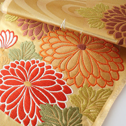 袋帯「流水色紙花文」梅垣織物