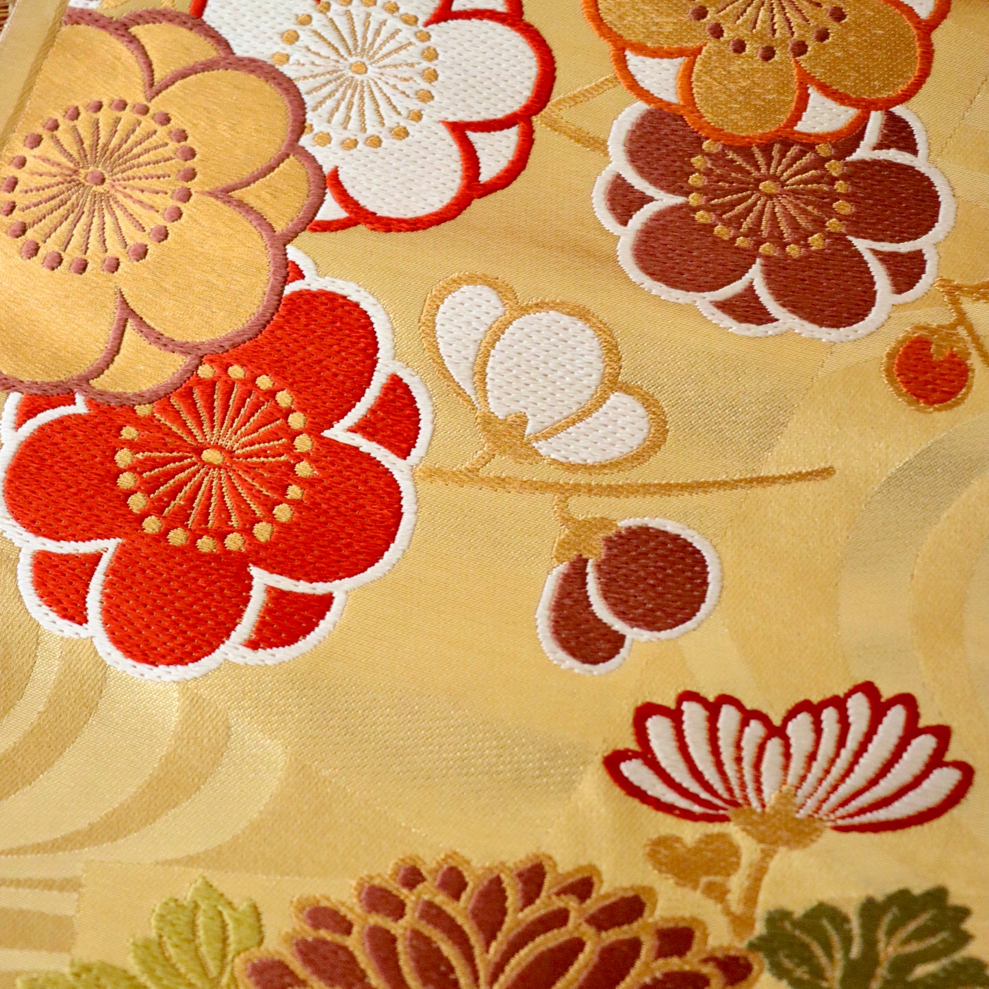 袋帯「流水色紙花文」梅垣織物