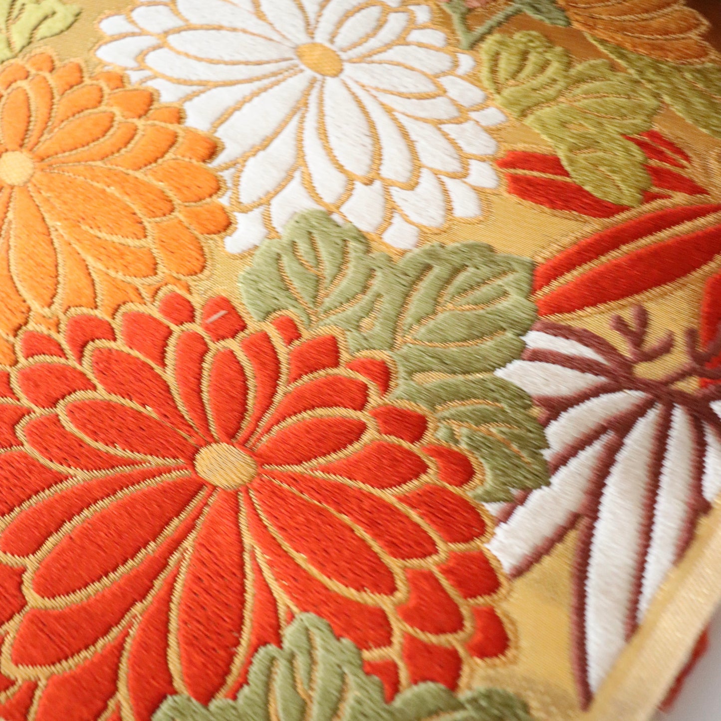 袋帯「斜取春秋花文」梅垣織物