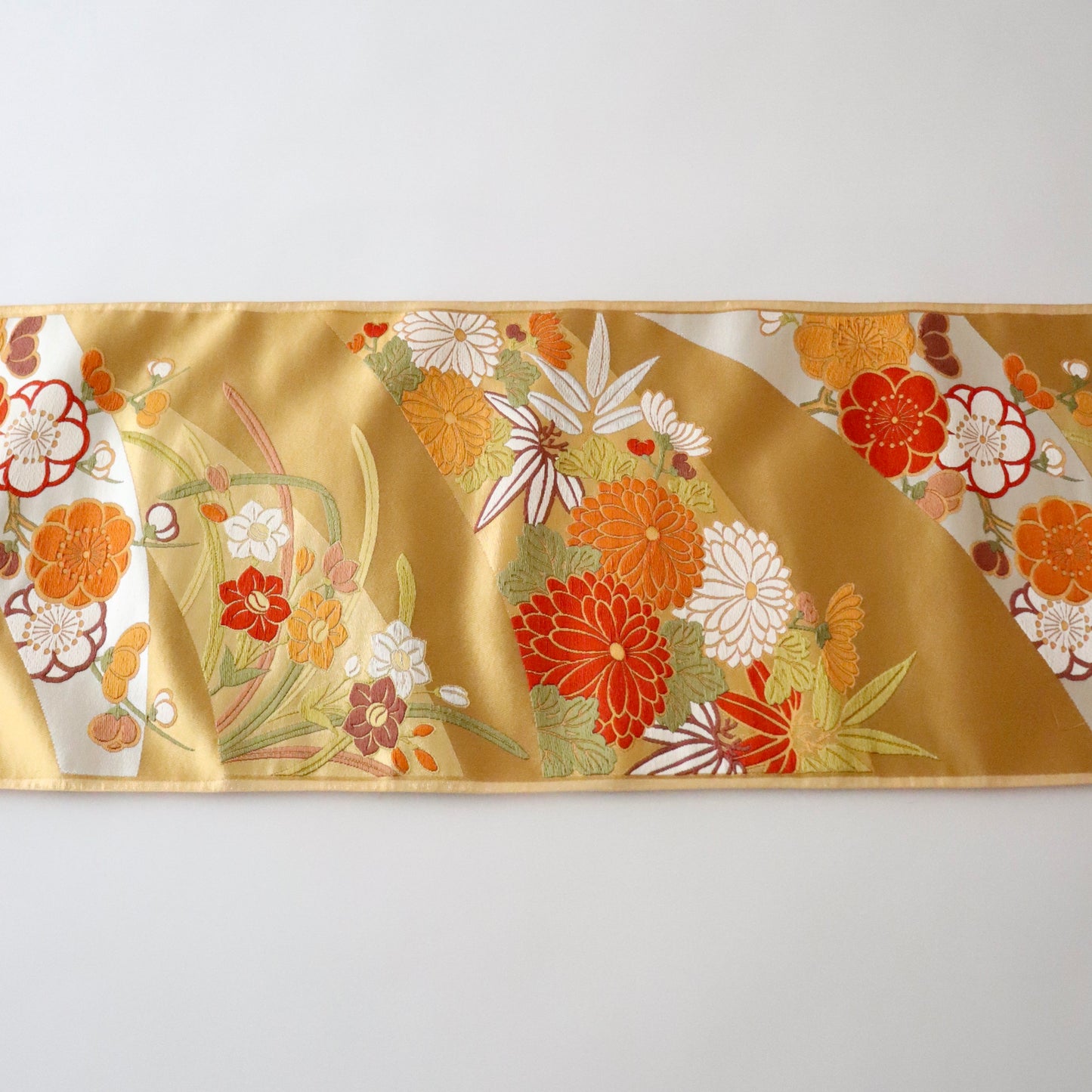 袋帯「斜取春秋花文」梅垣織物