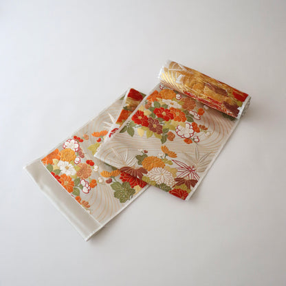 袋帯「流水菊椿文」梅垣織物