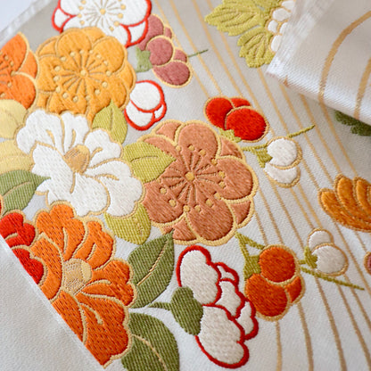 袋帯「流水菊椿文」梅垣織物