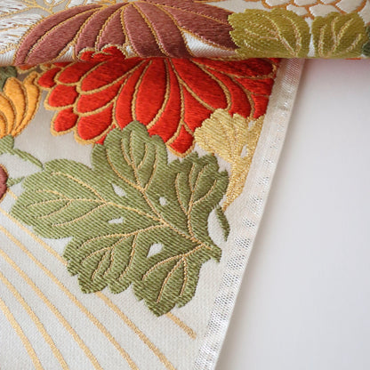 袋帯「流水菊椿文」梅垣織物